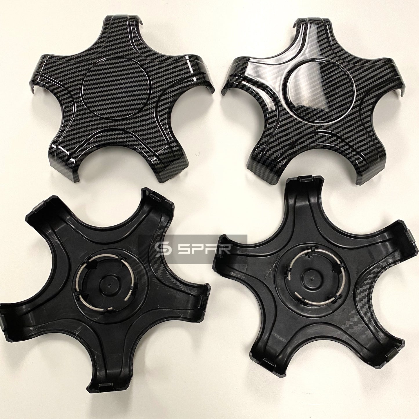 غطاء من الكاربون فايبر لمسامير الاطار بخمس زوايا يوضع في المنتصف لسيارة من نوع تيسلا الطراز 3